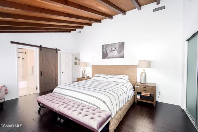 a bathroom with a granite countertop sink mirror and a