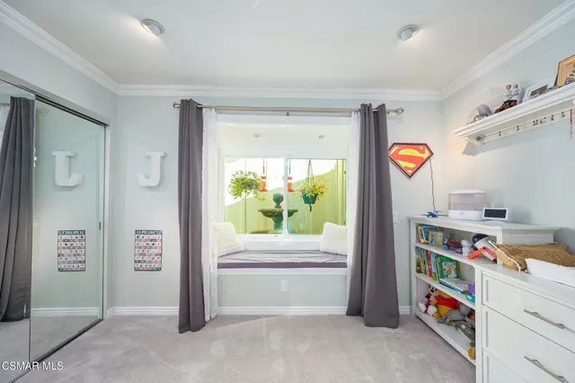 a room with toys and a dresser