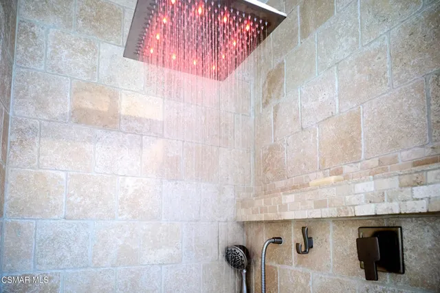 a living room with patio a couch and chairs