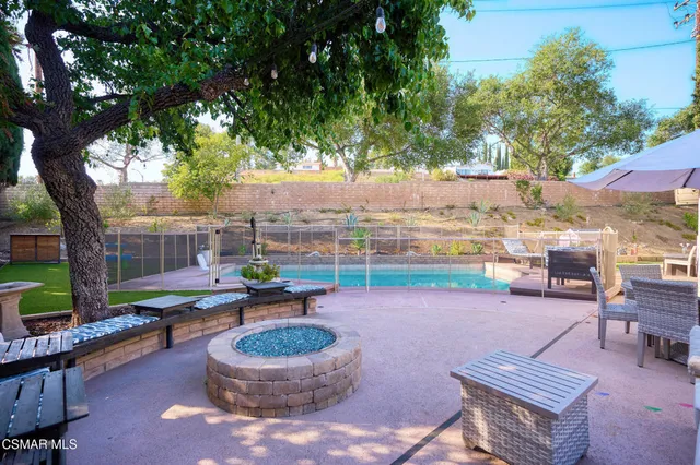 a outdoor space with patio the couches and a potted plant