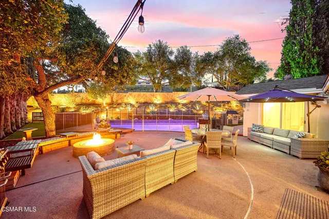 a view of a swimming pool with a patio