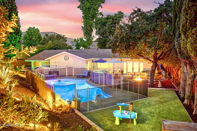 an aerial view of residential house with outdoor space