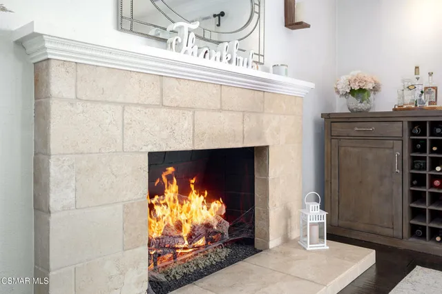 a view of a dining room with furniture and window