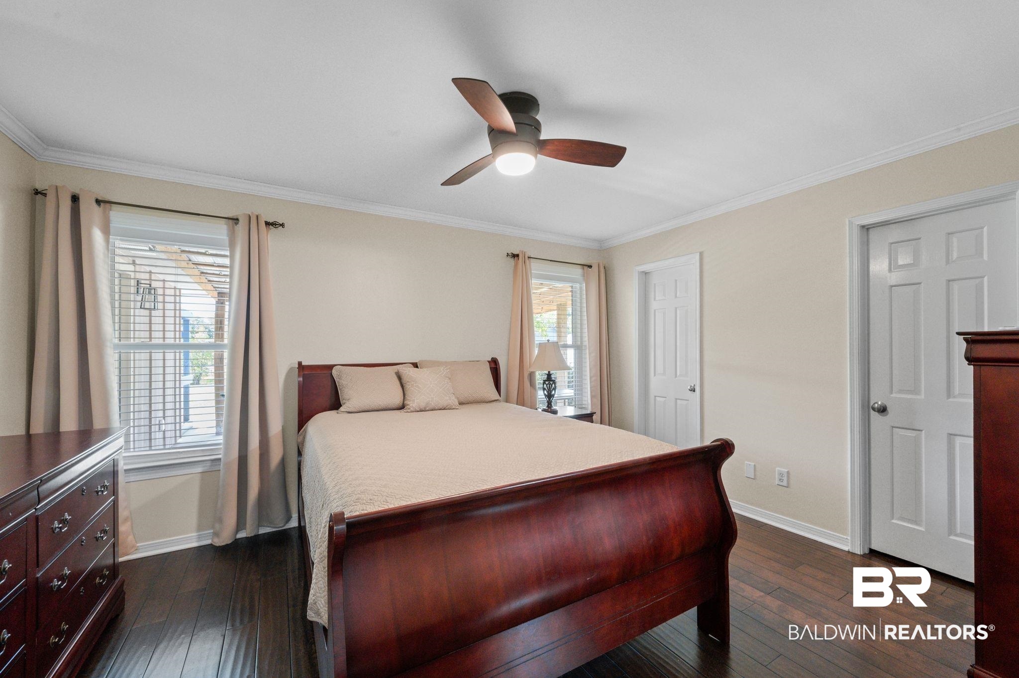 20037 County Road 33 Fairhope, AL 36532 - Photo 31 of 79 Bedroom featuring crown molding, ceiling fan, and dark hardwood / wood-style flooring