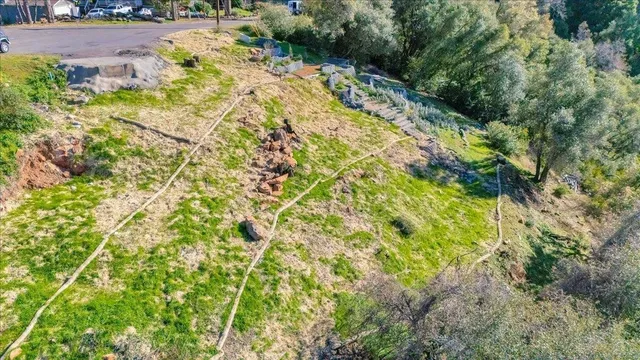 a view of a yard with an outdoor space