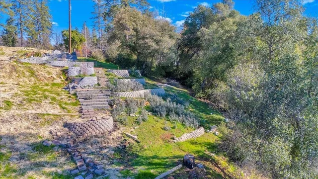 a view of a backyard of a house