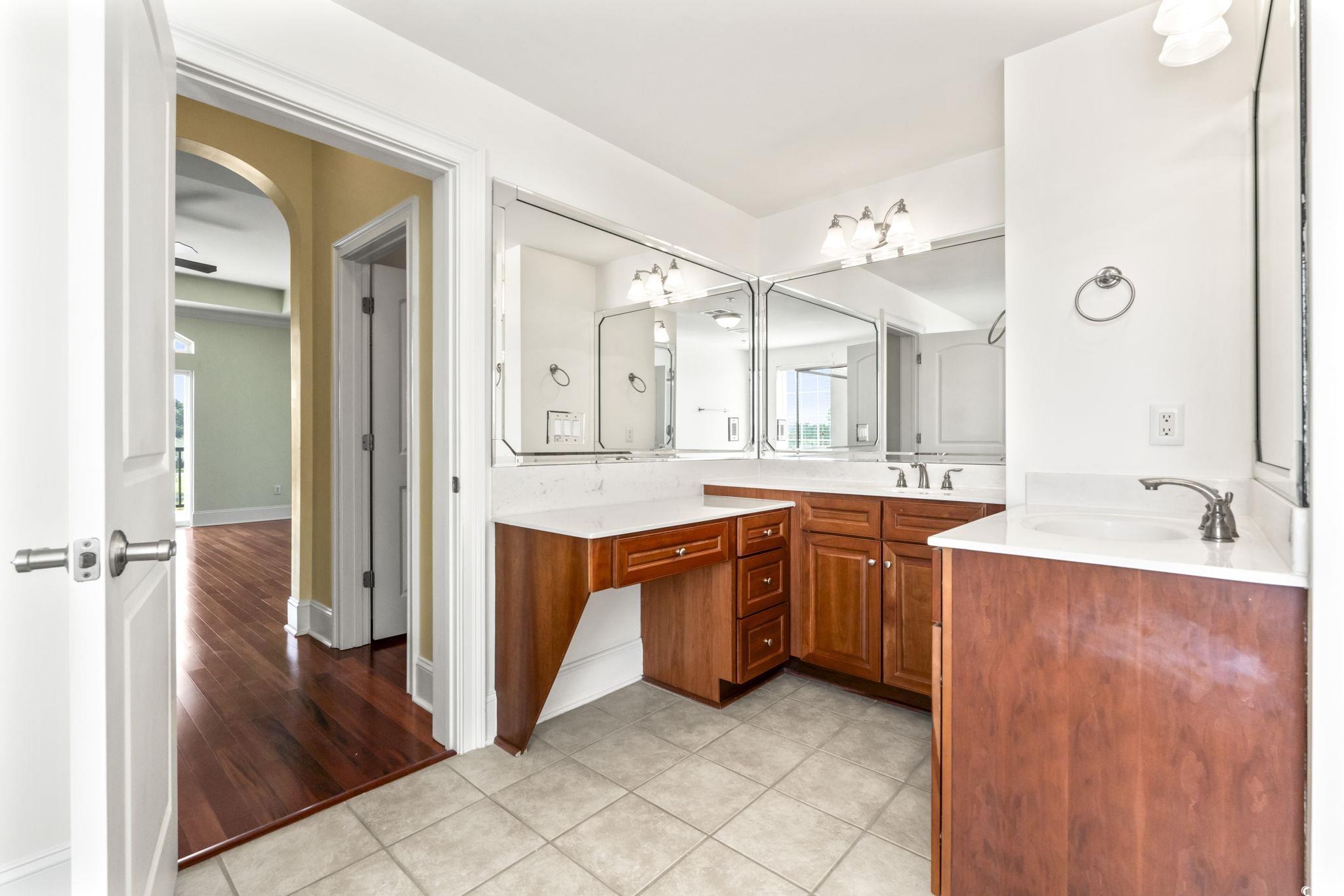 249 Venice Way, Unit 3301 Myrtle Beach, SC 29577 - Photo 22 of 40 Full bath featuring two vanities and light tile patterned floors