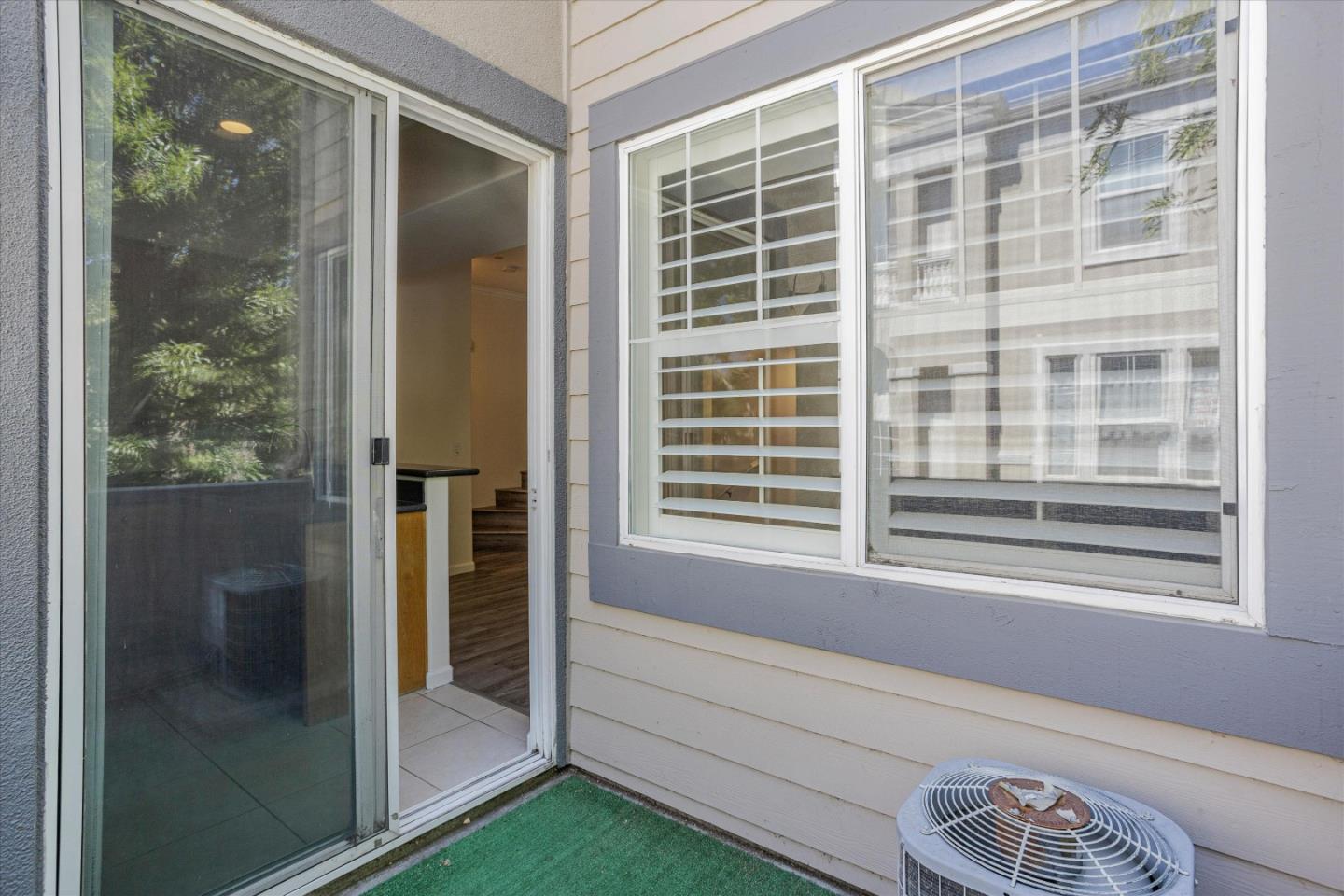 105 Serenity Place Milpitas, CA 95035 - Photo 15 of 36 a view of entry way with wooden floor and a bathroom view