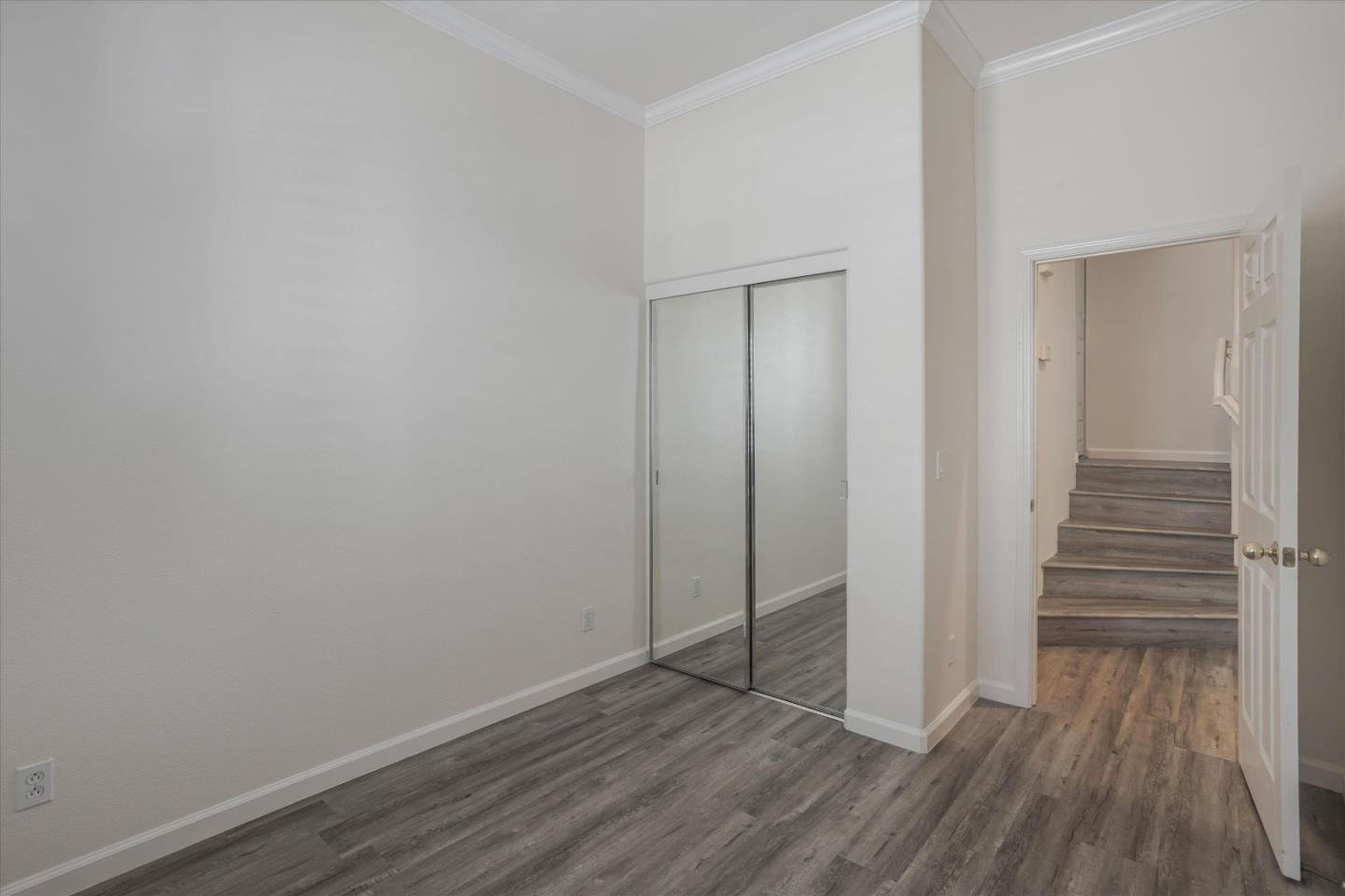 105 Serenity Place Milpitas, CA 95035 - Photo 19 of 36 a view of a room with wooden floor