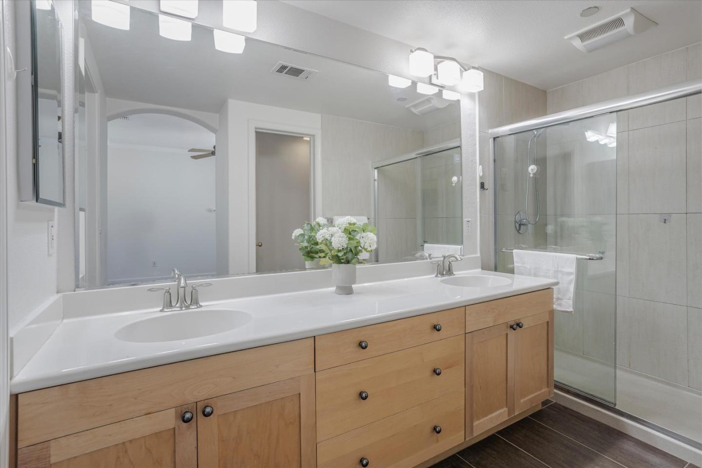 105 Serenity Place Milpitas, CA 95035 - Photo 25 of 36 a bathroom with a granite countertop sink double and mirror