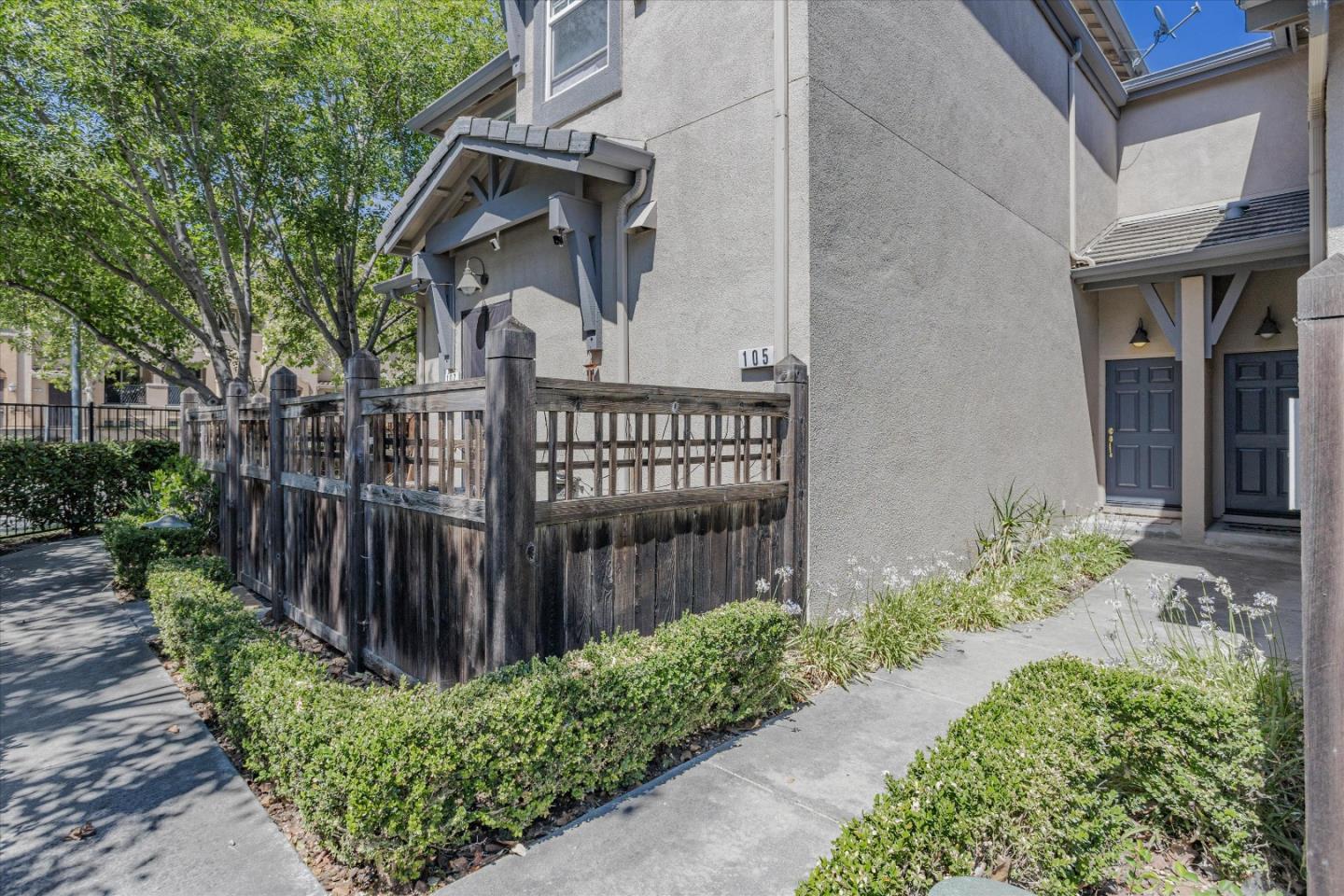 105 Serenity Place Milpitas, CA 95035 - Photo 3 of 36 a view of a house with wooden fence