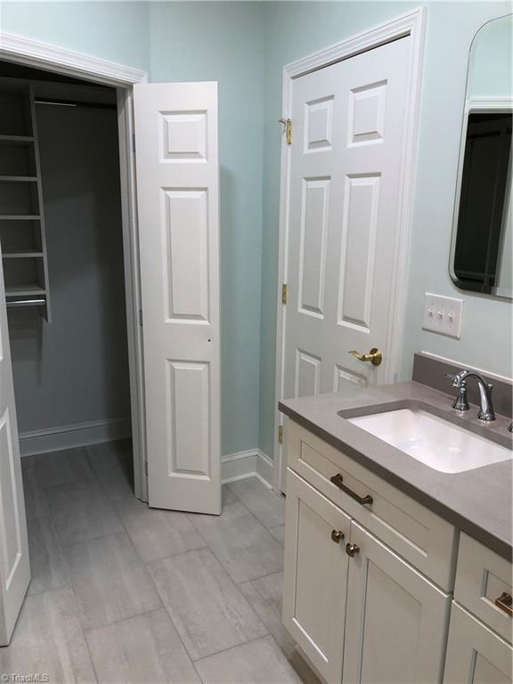 1209 Stadler Ridge Road Winston-Salem, NC 27106 - Photo 21 of 28 Master bath with 2nd closet and shelving