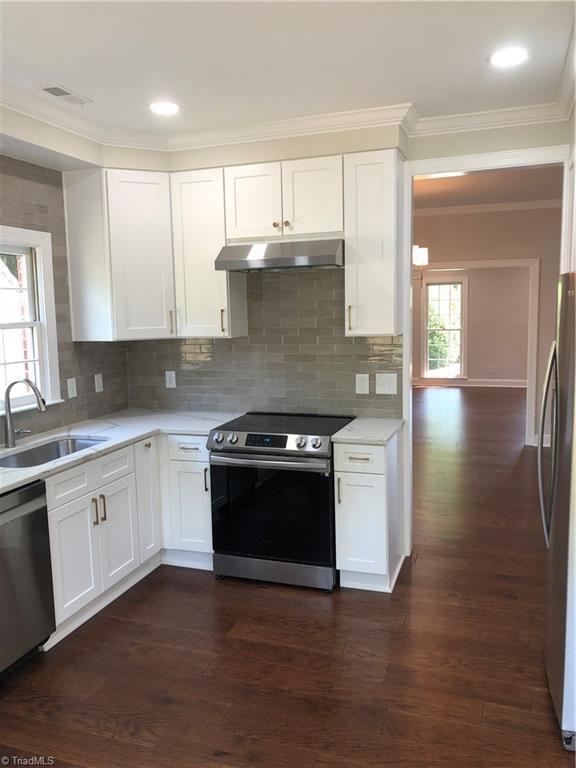 1209 Stadler Ridge Road Winston-Salem, NC 27106 - Photo 7 of 28 Kitchen leading to Dining room