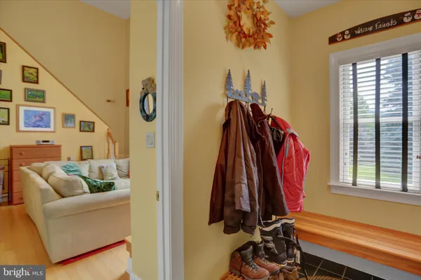 a room with a window and gym equipment