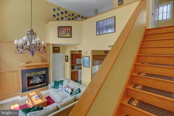 a kitchen with a sink cabinets and a window
