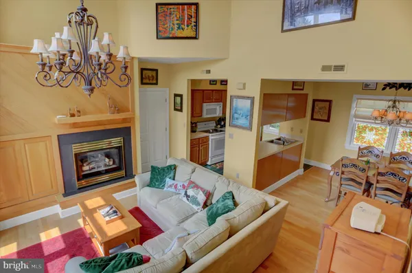 a kitchen with a refrigerator and a sink