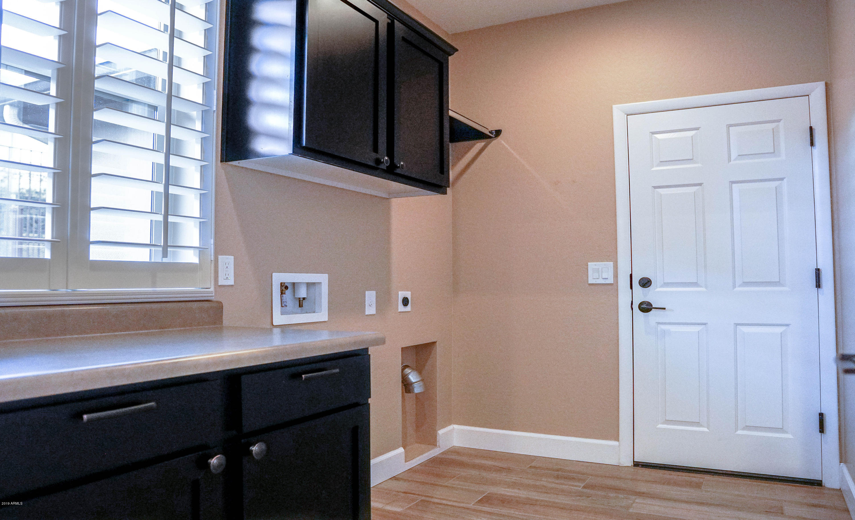 3249 Rising Sun Ridge Wickenburg, AZ 85390 - Photo 16 of 38 Oversized Laundry off Kitchen
