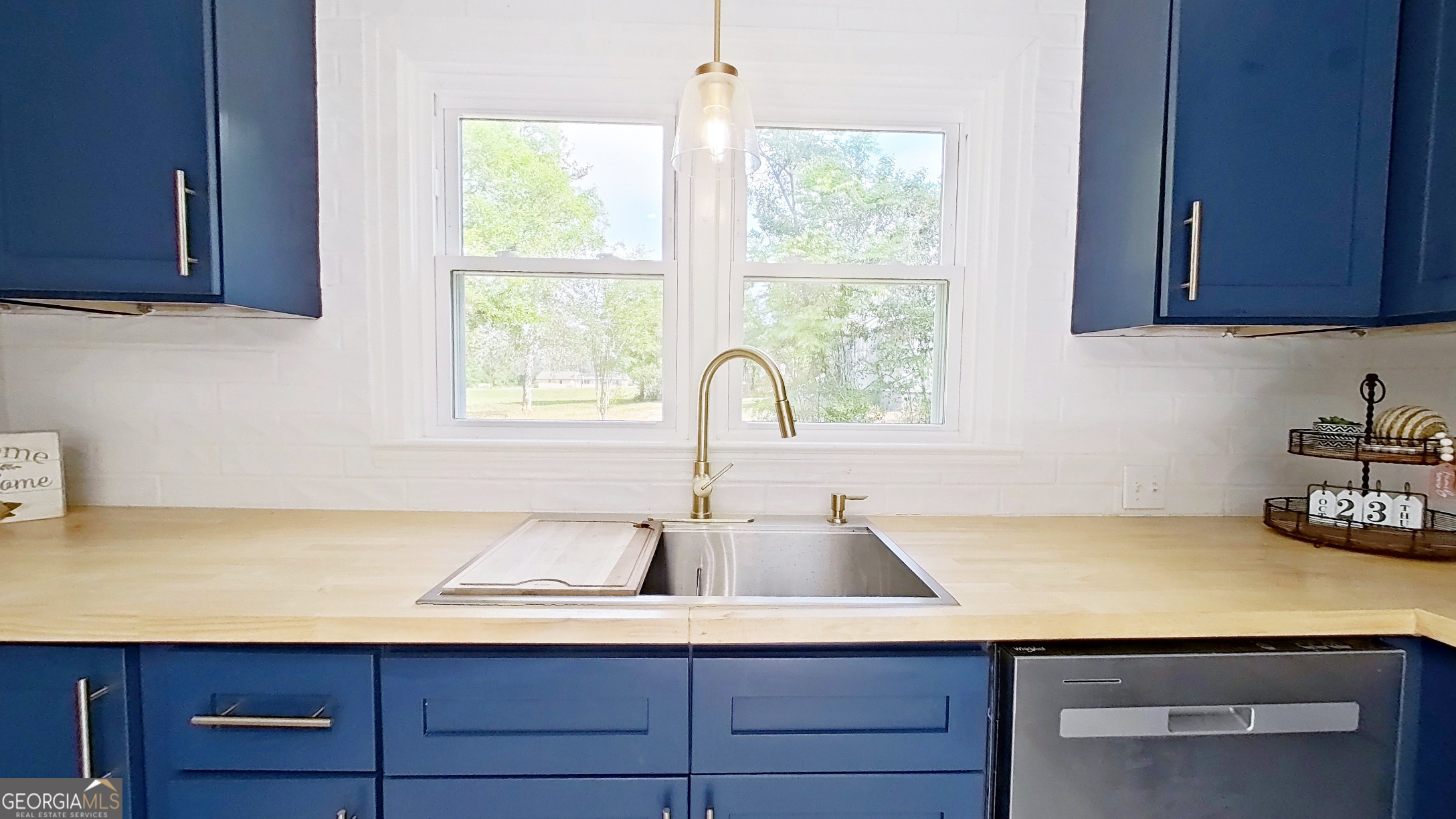 481 4th Street Southeast Cairo, GA 39828 - Photo 19 of 55 a kitchen with a sink cabinets and window