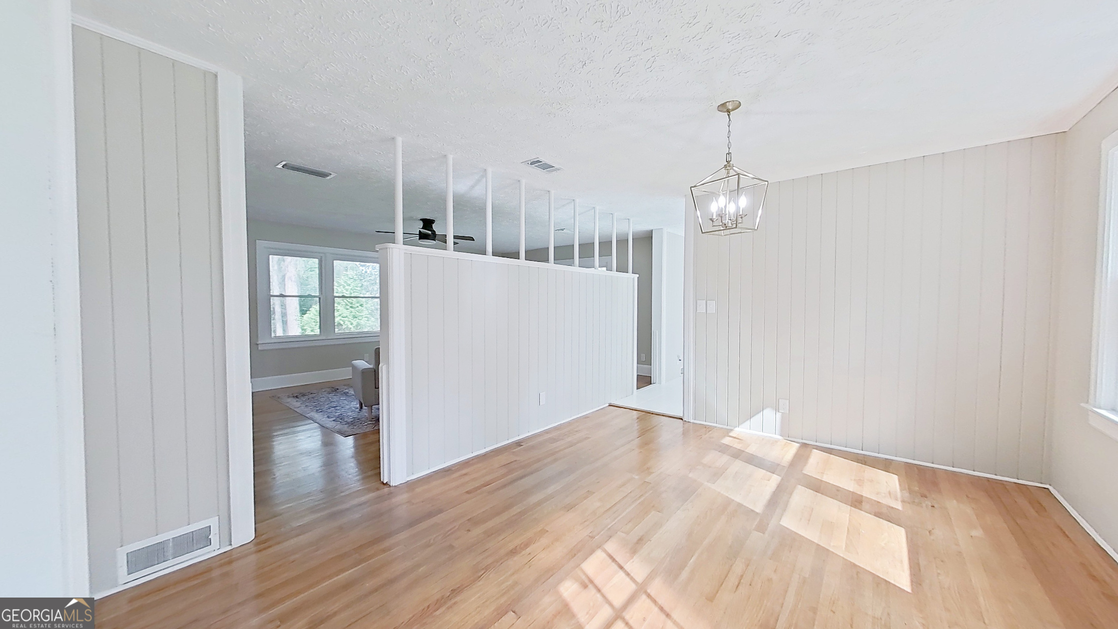 481 4th Street Southeast Cairo, GA 39828 - Photo 23 of 55 a view of a room with wooden floor and a bathroom