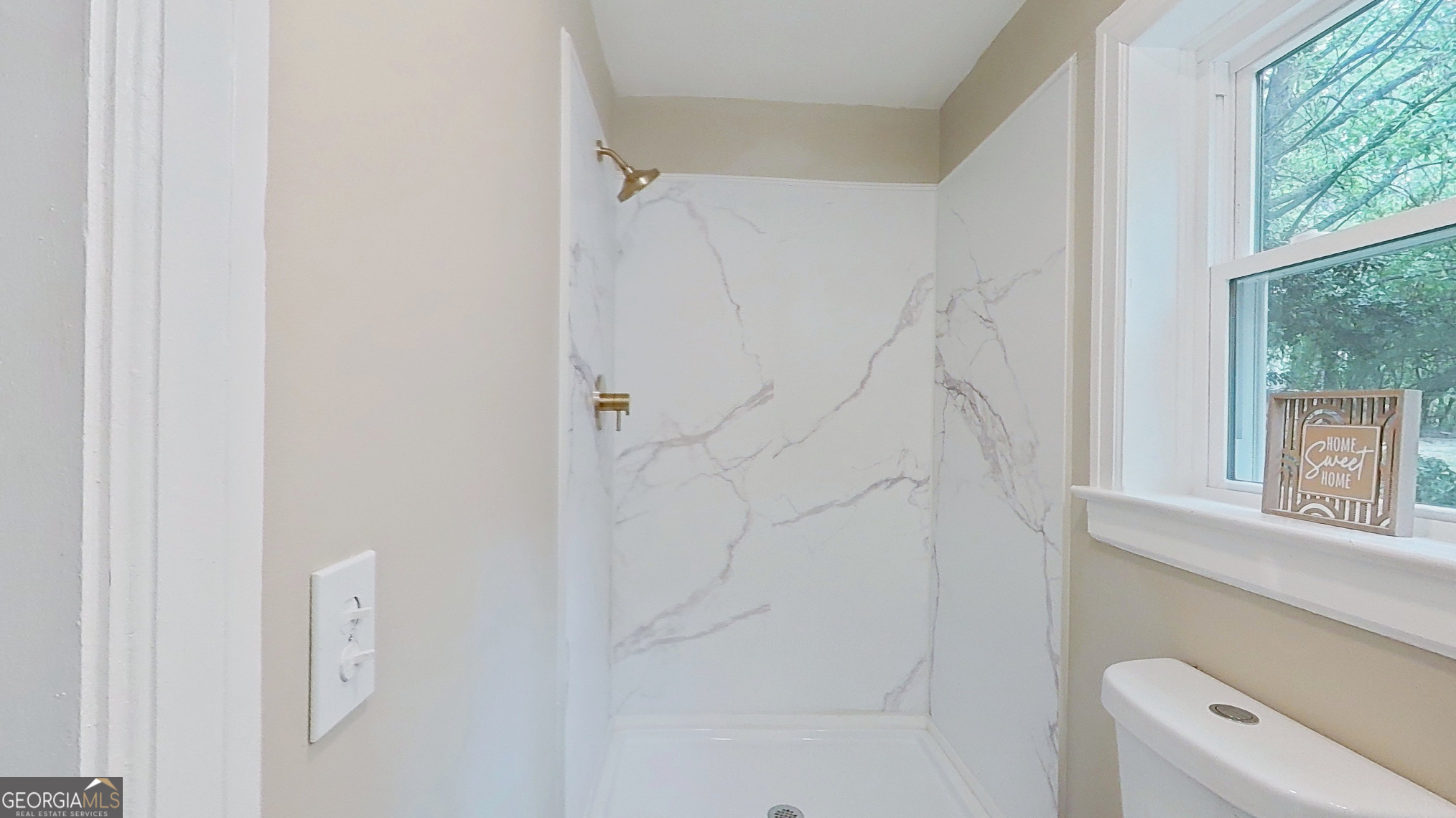481 4th Street Southeast Cairo, GA 39828 - Photo 35 of 55 a bathroom with a shower and a toilet