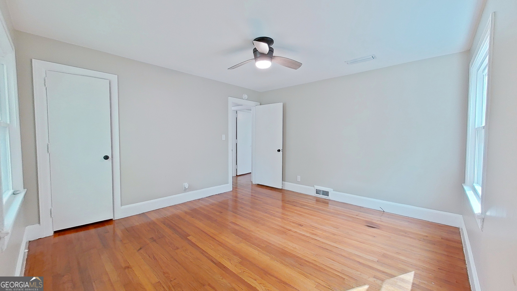 481 4th Street Southeast Cairo, GA 39828 - Photo 40 of 55 a view of an empty room with wooden floor