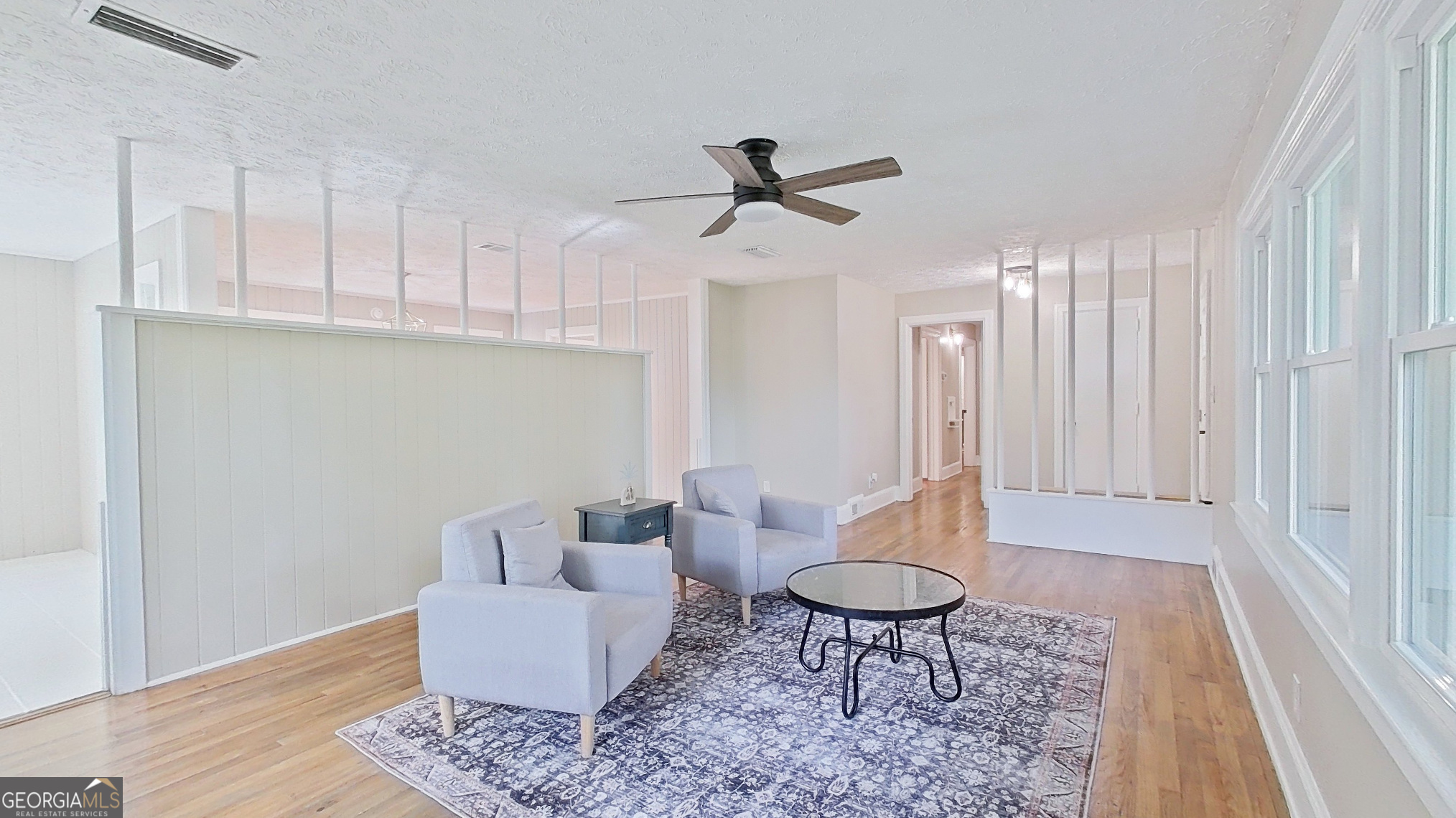 481 4th Street Southeast Cairo, GA 39828 - Photo 7 of 55 a living room with furniture and a rug