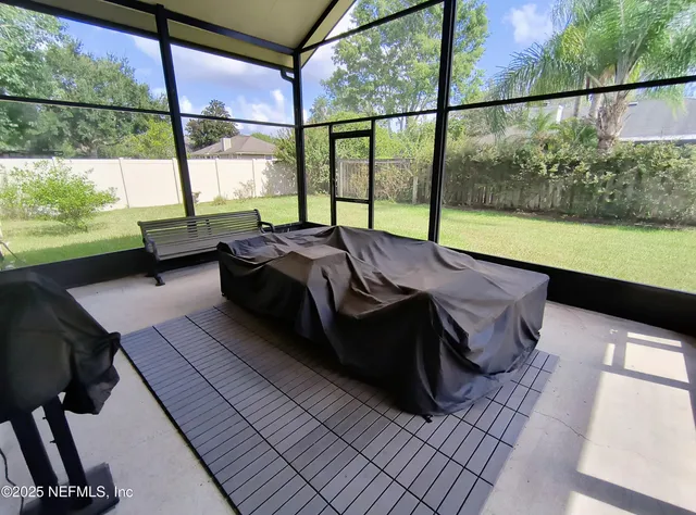 a living room with large window