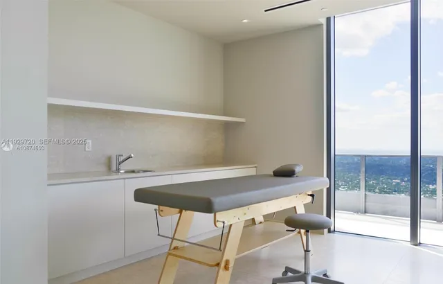 a room with a table and chairs