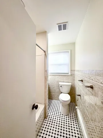 a bathroom with a toilet