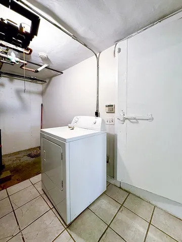 a utility room with a washer and dryer