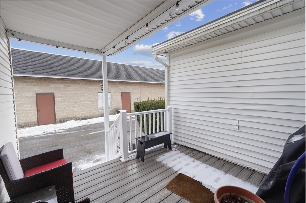 72 Main Street Pepperell, MA 01463 - Photo 26 of 26 a view of deck with furniture