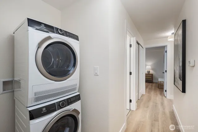 a view of a storage & utility room with washer and dryer