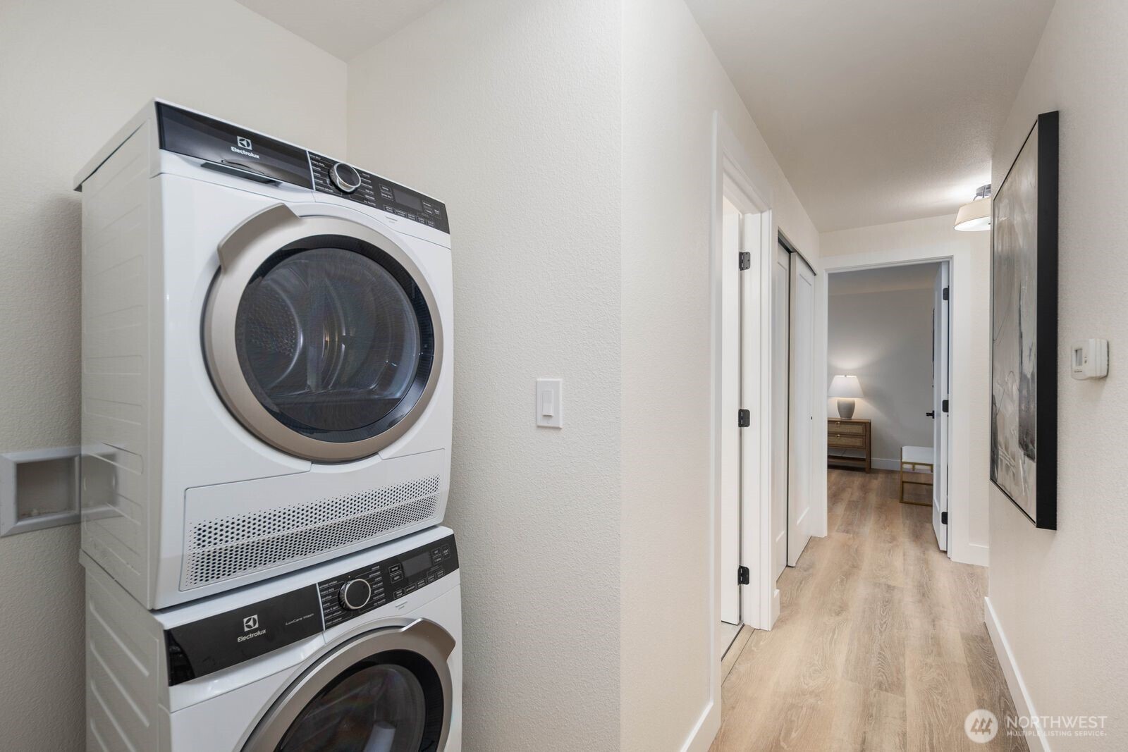 2525 178th Street Southeast Bothell, WA 98012 - Photo 17 of 39 a view of a storage & utility room with washer and dryer