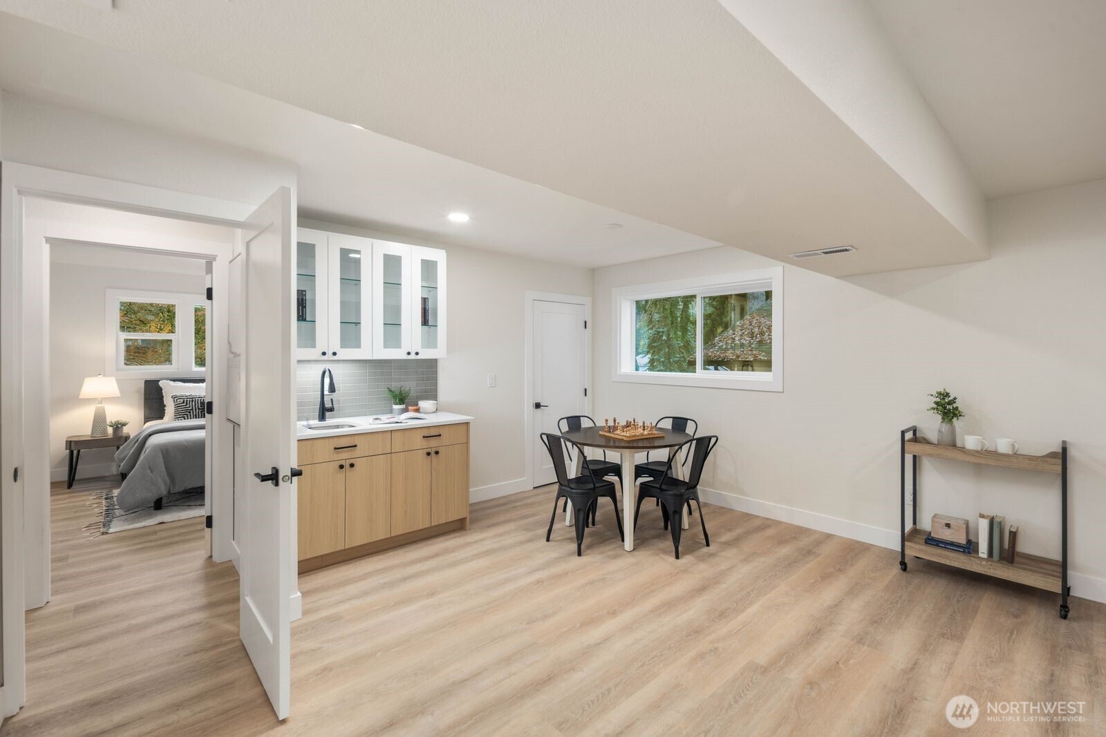2525 178th Street Southeast Bothell, WA 98012 - Photo 26 of 39 a dining room with furniture and wooden floor