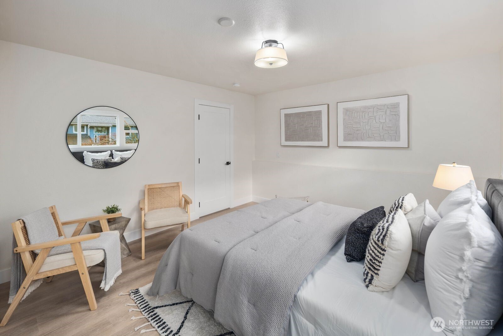 2525 178th Street Southeast Bothell, WA 98012 - Photo 28 of 39 a bedroom with a bed and chandelier