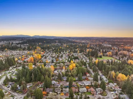 a view of a city with mountains in the background