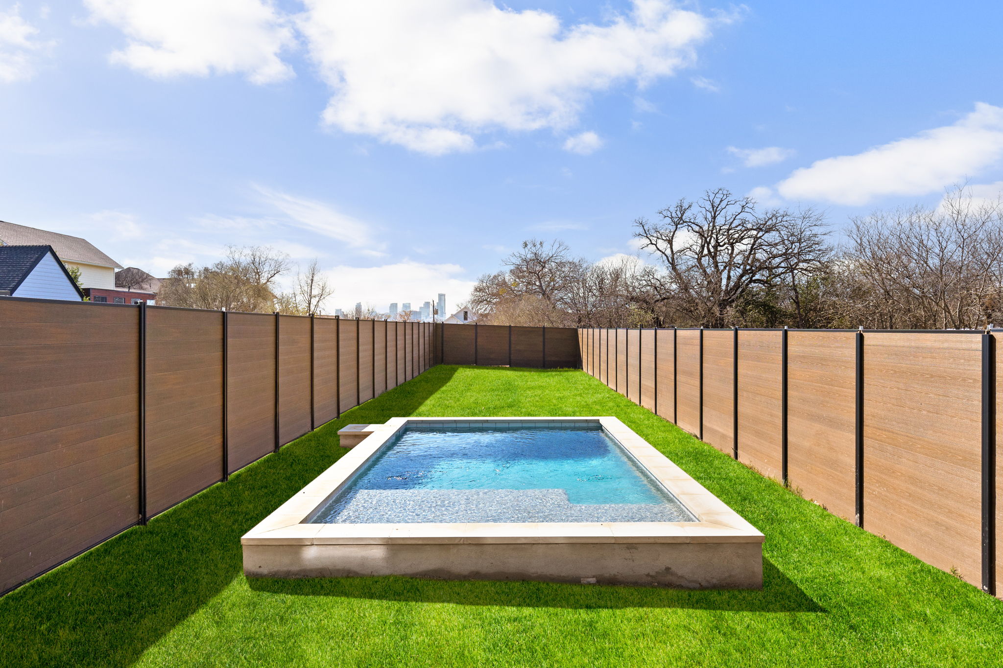 1610 Harvey Street, Unit 1 Austin, TX 78702 - Photo 16 of 39 View of pool with a fenced backyard and patio surround