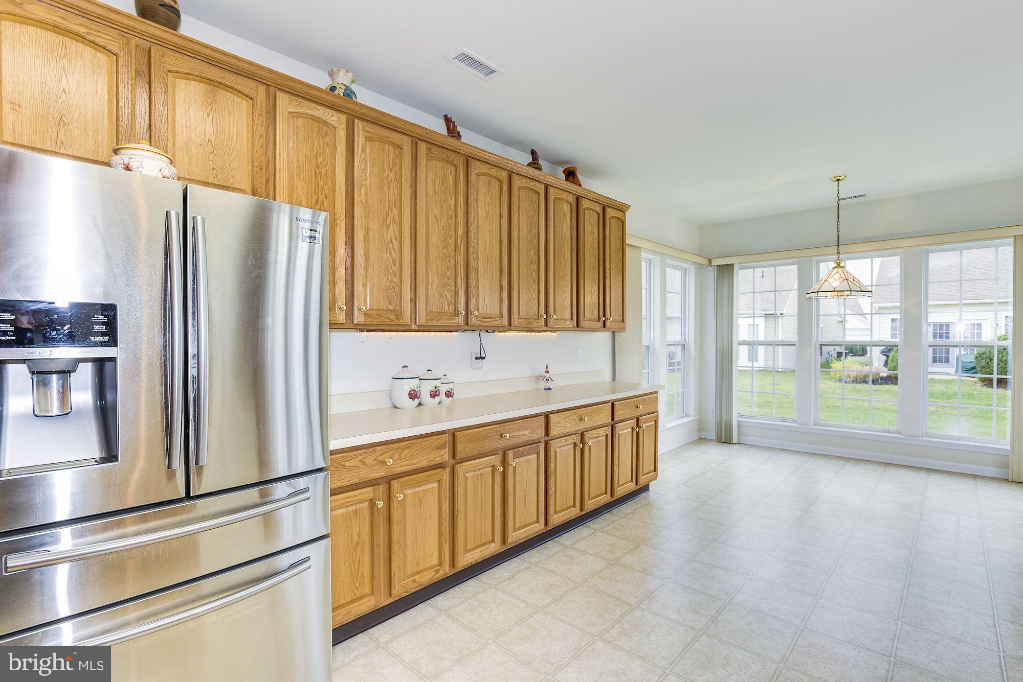 18 Wolverton Place Riverside, NJ 08075 - Photo 11 of 35 Kitchen Refrigerator and Wall of Cabinets