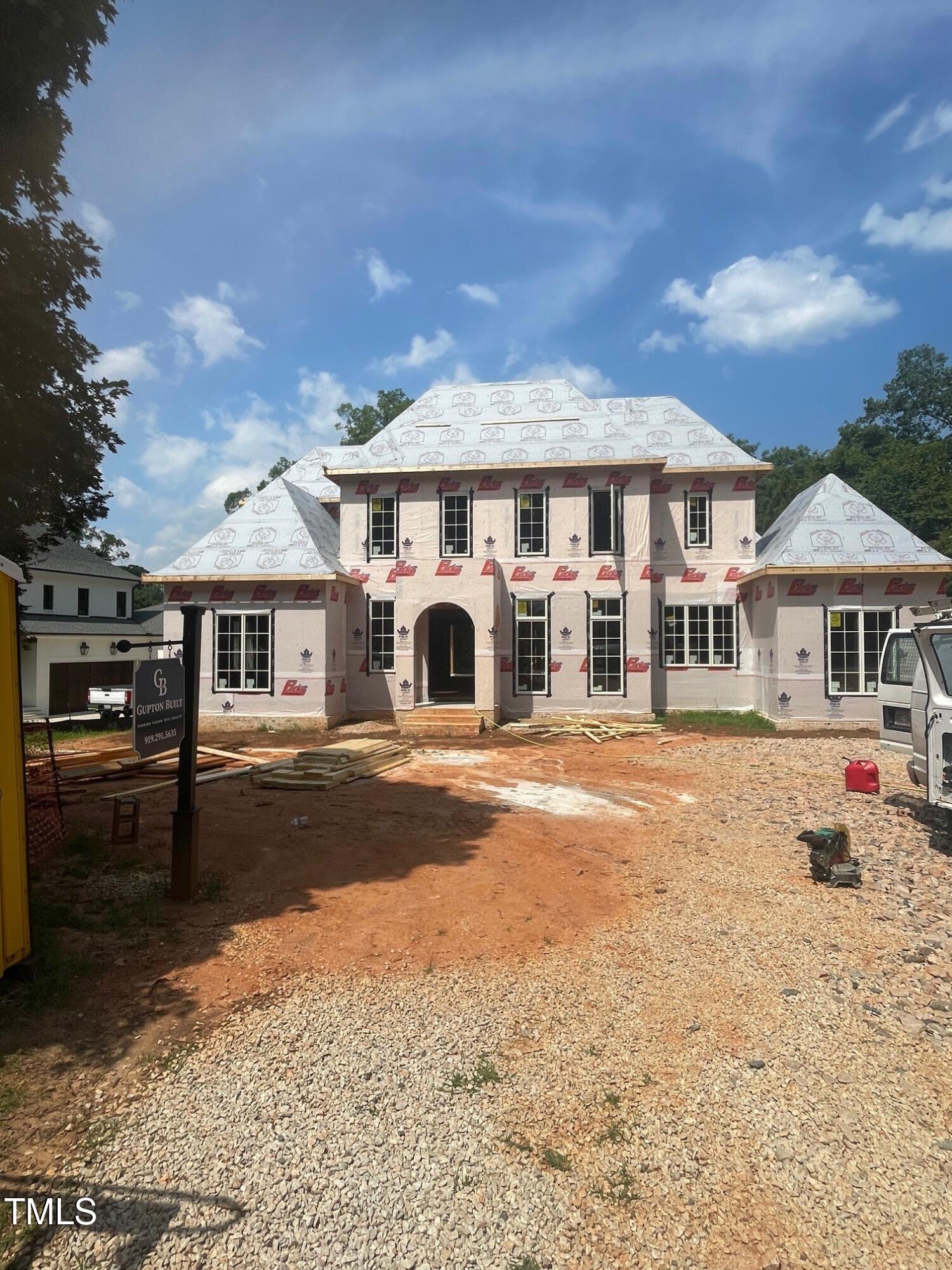 2211 Wheeler Road Raleigh, NC 27607 - Photo 2 of 9 a front view of a house with yard