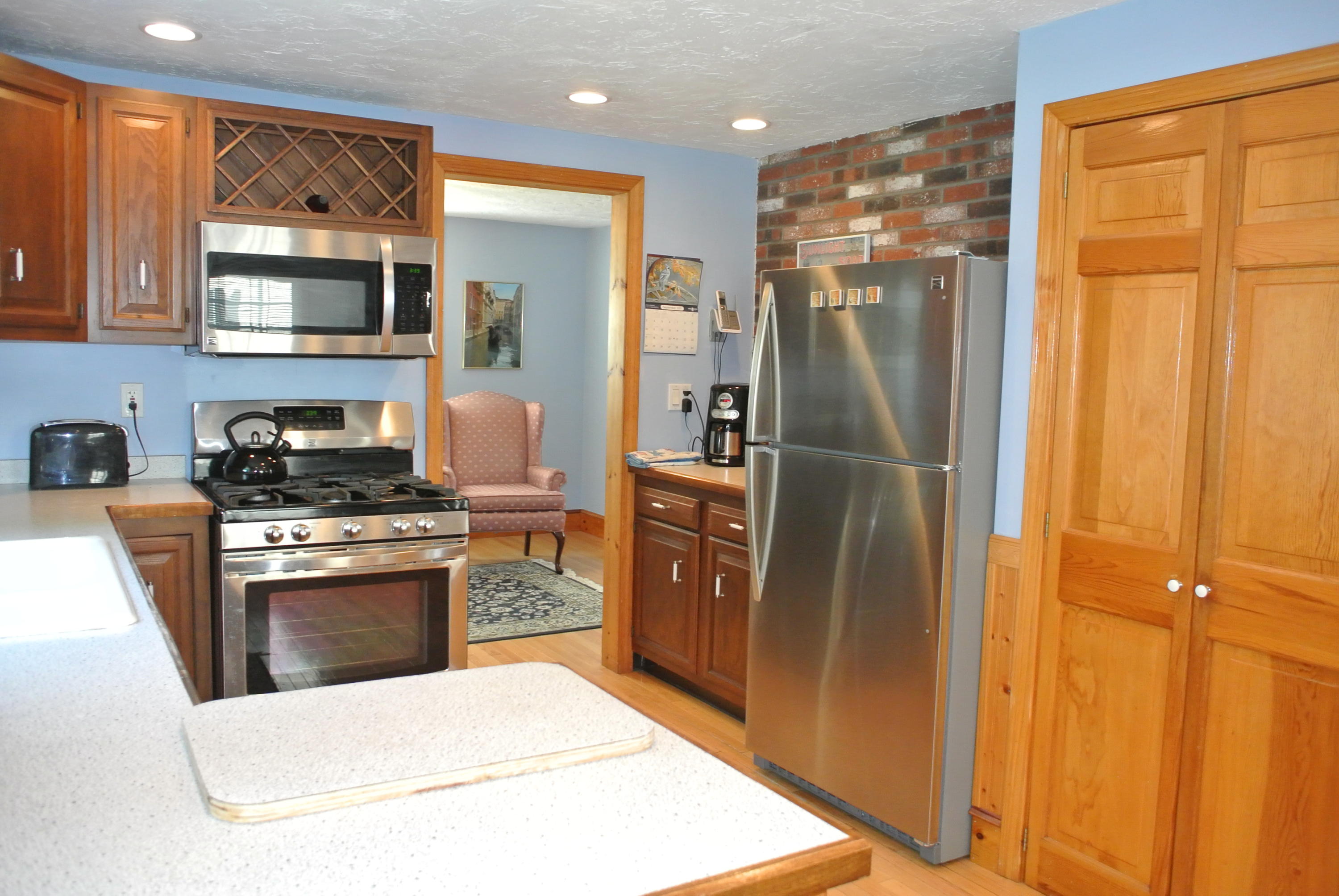 4 Alma Road Mashpee, MA 02649 - Photo 11 of 19 a kitchen with stainless steel appliances granite countertop a refrigerator and a stove