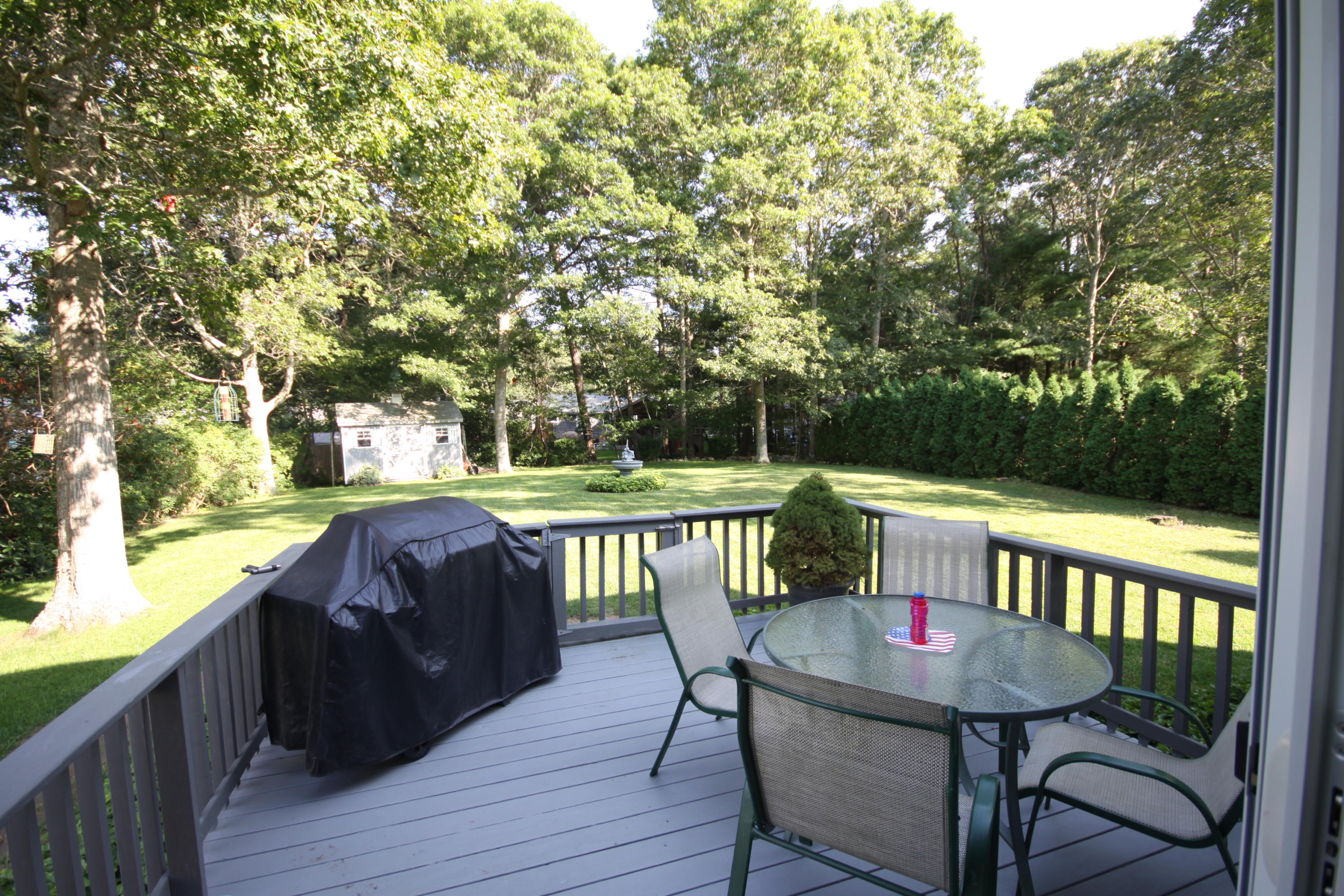 4 Alma Road Mashpee, MA 02649 - Photo 6 of 19 a view of a two chairs in the deck
