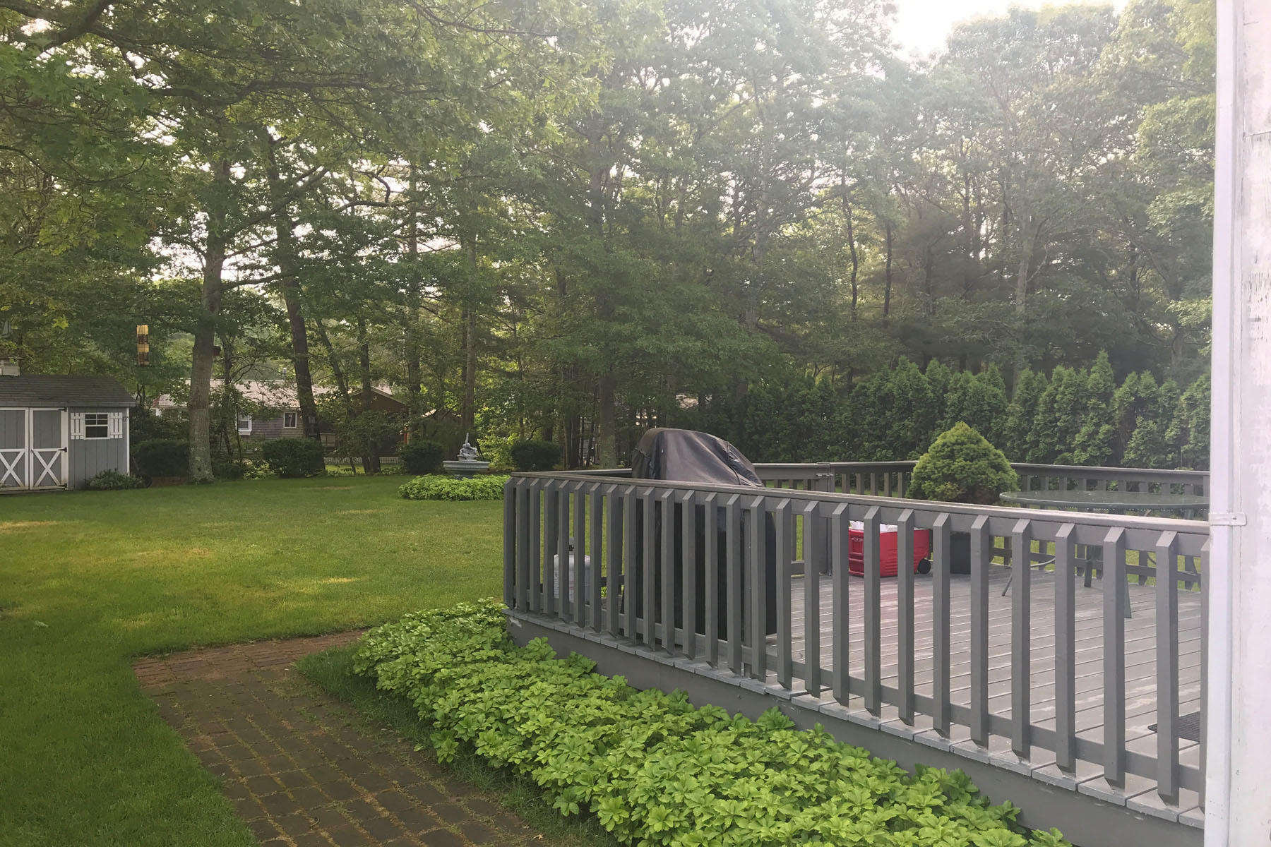 4 Alma Road Mashpee, MA 02649 - Photo 7 of 19 a view of a wrought iron fences in front of house