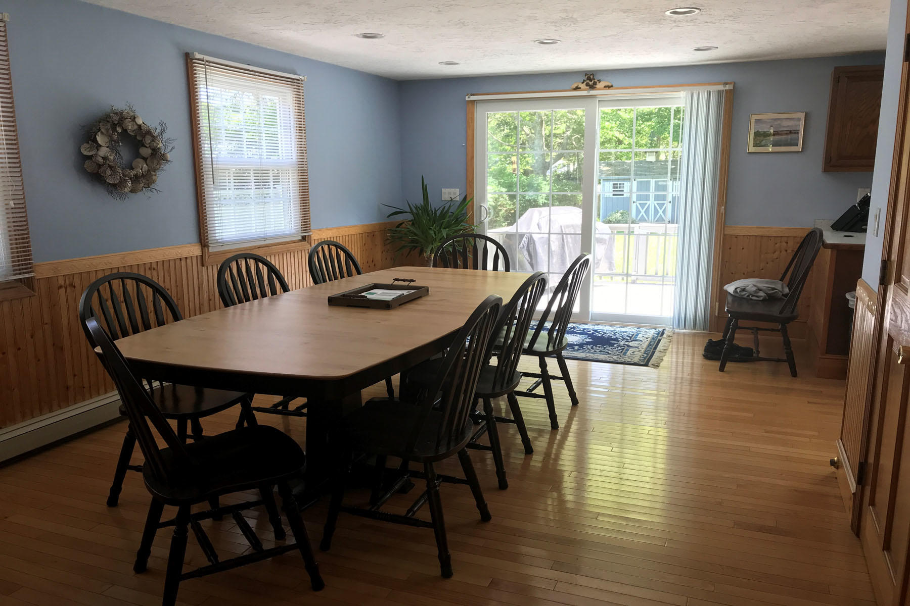 4 Alma Road Mashpee, MA 02649 - Photo 9 of 19 a view of a dining room with furniture window and wooden floor