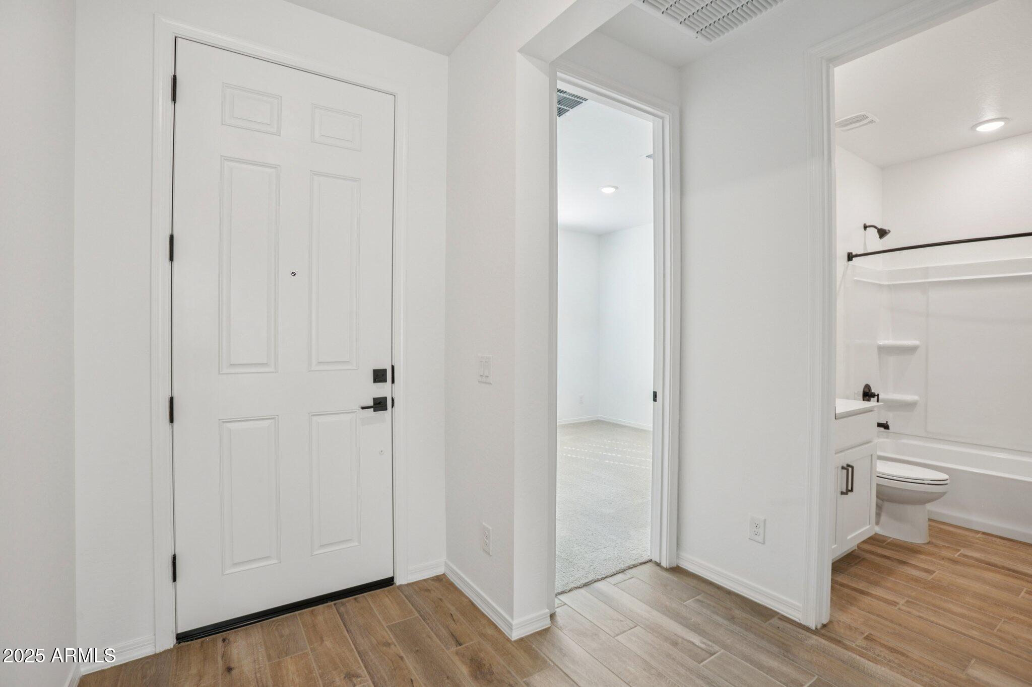 5528 West Hopi Trail Laveen, AZ 85339 - Photo 14 of 51 a view of bathroom with a toilet sink