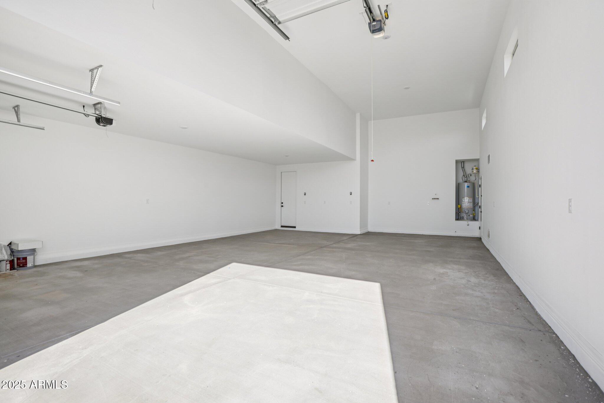 5528 West Hopi Trail Laveen, AZ 85339 - Photo 32 of 51 a view of a room with rack on the wall