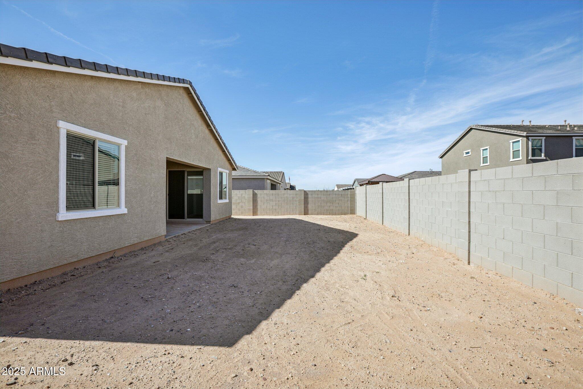 5528 West Hopi Trail Laveen, AZ 85339 - Photo 35 of 51 a front view of a house with a yard