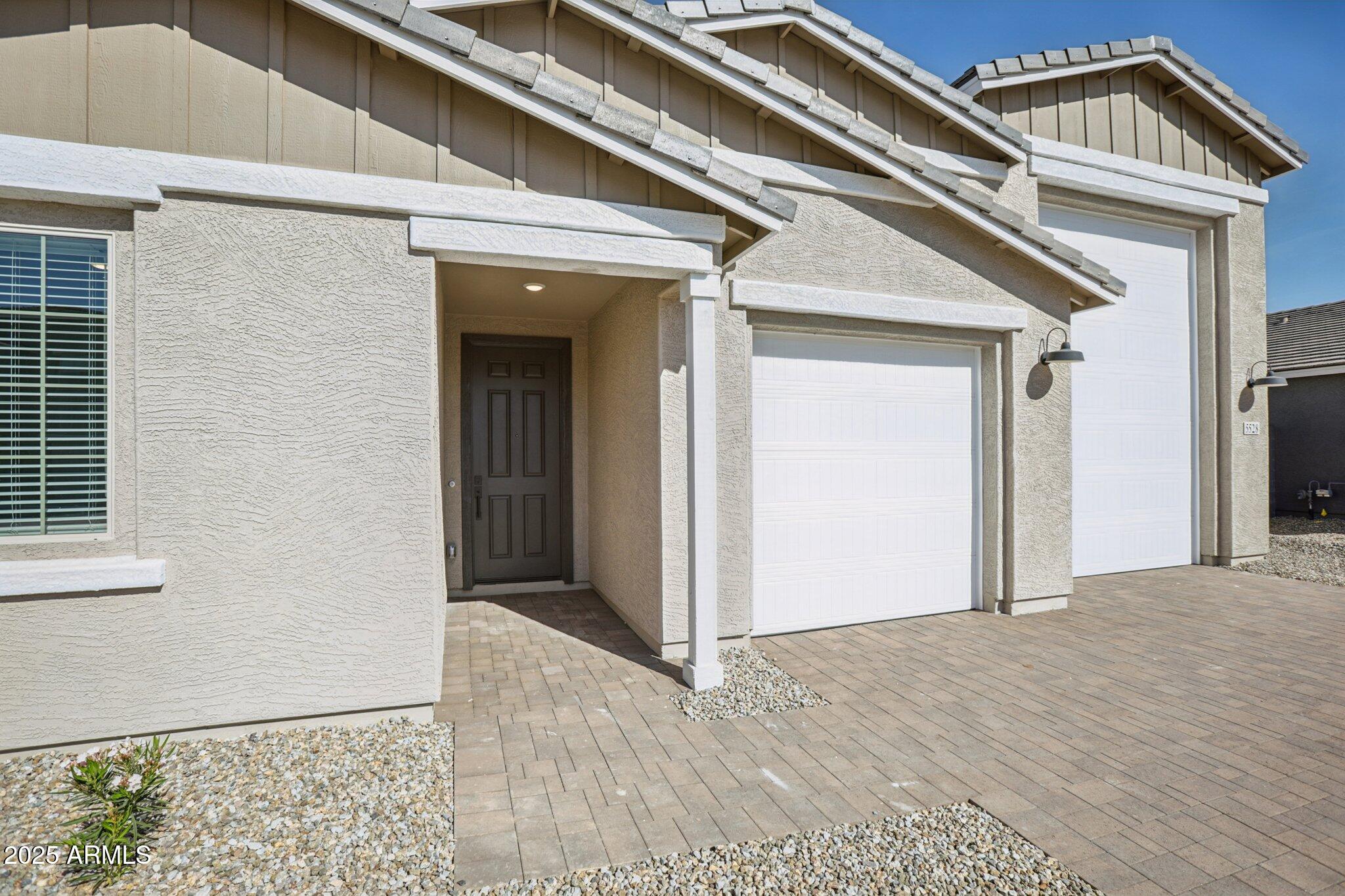 5528 West Hopi Trail Laveen, AZ 85339 - Photo 4 of 51 a view of a house with a outdoor space