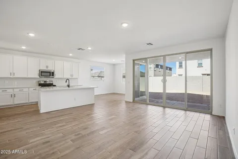 a view of kitchen with wooden floor