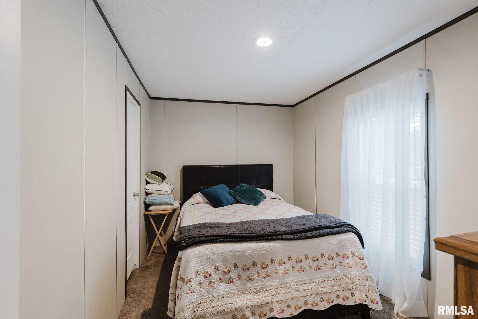 344 Seba Street Hurst, IL 62949 - Photo 22 of 34 a bedroom with a bed and a window