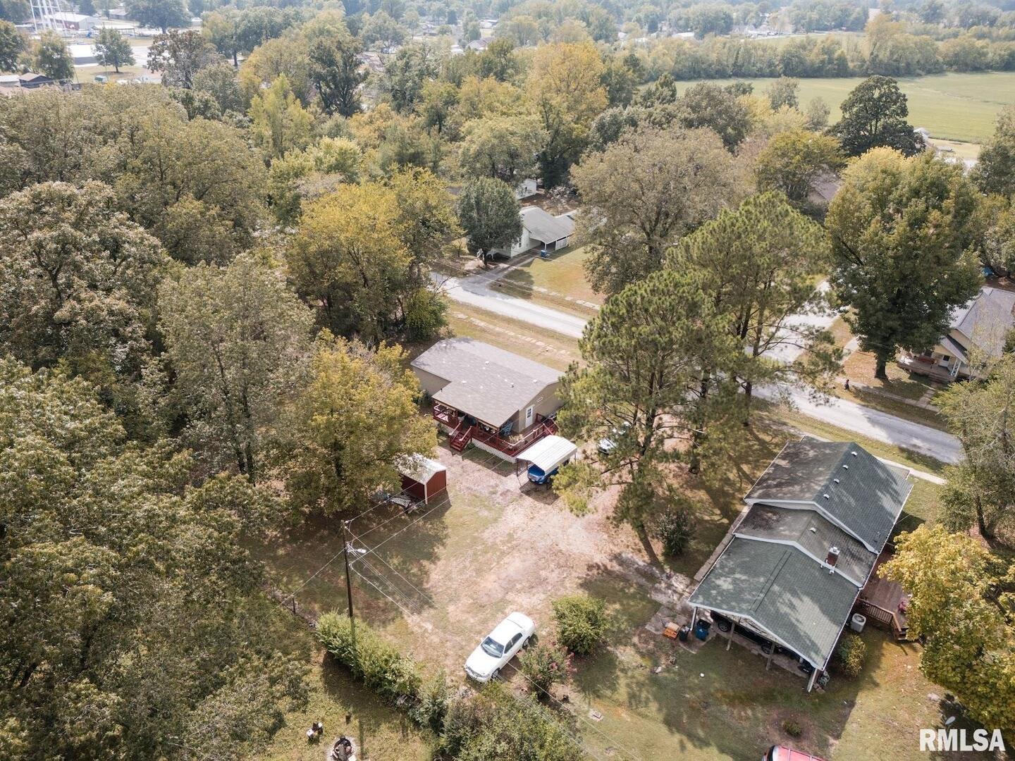 344 Seba Street Hurst, IL 62949 - Photo 34 of 34 an aerial view of a house with a lake view